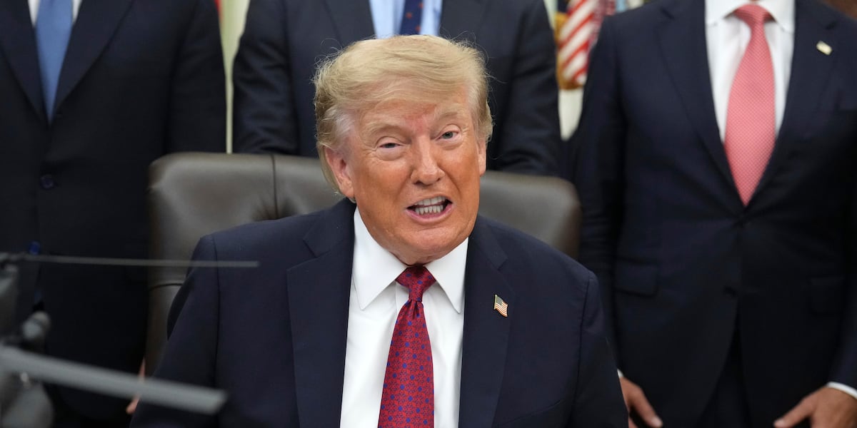 Lower Intrest Rates Trump threatens trade action over Fed interest rates